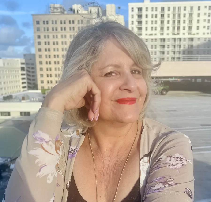 A smiling Lush client outside the salon in downtown West Palm Beach